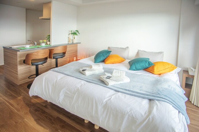 Imagen de la habitación del Hotel Hoyou Suite Residence Osaka Ashiharabashi Station Front. Foto 32