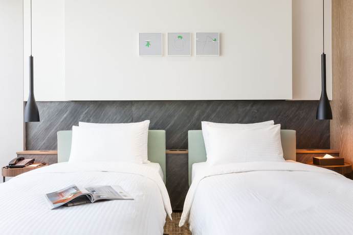 Imagen de la habitación del Hotel Hsin. Foto 11