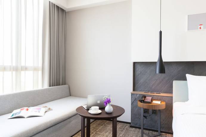 Imagen de la habitación del Hotel Hsin. Foto 13