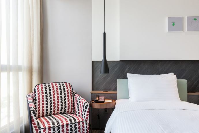 Imagen de la habitación del Hotel Hsin. Foto 15