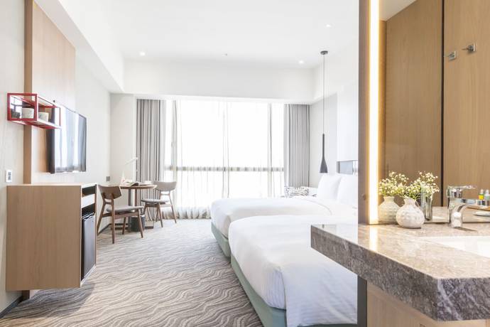 Imagen de la habitación del Hotel Hsin. Foto 16