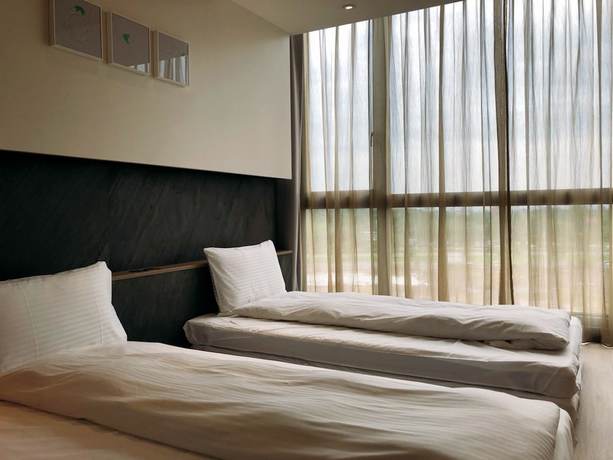 Imagen de la habitación del Hotel Hsin. Foto 19
