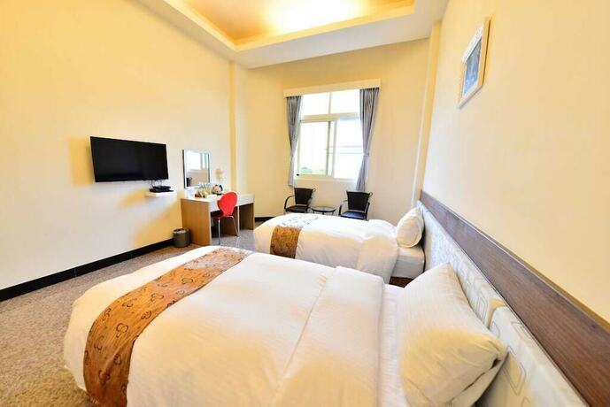 Imagen de la habitación del Hotel Hu Ye Resort. Foto 25