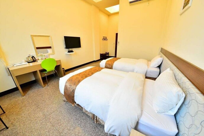Imagen de la habitación del Hotel Hu Ye Resort. Foto 27
