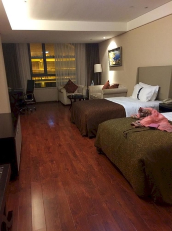 Imagen de la habitación del Hotel Hua Bin International. Foto 2