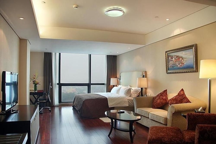 Imagen de la habitación del Hotel Hua Bin International. Foto 3