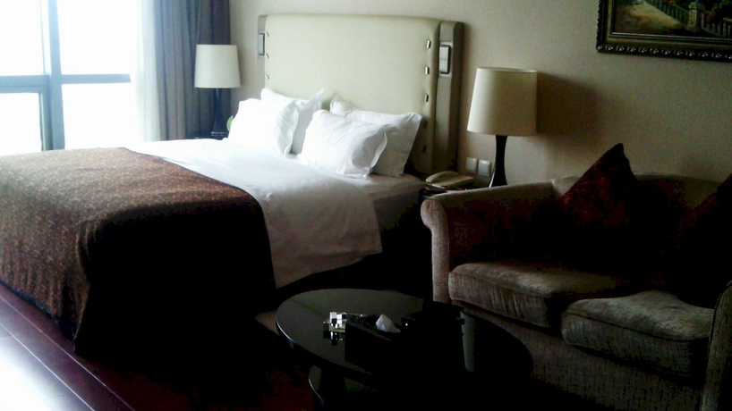 Imagen de la habitación del Hotel Hua Bin International. Foto 10