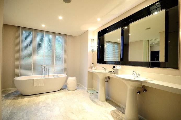 Imagen de la habitación del Hotel Hua Chang Heritage Bangkok. Foto 5