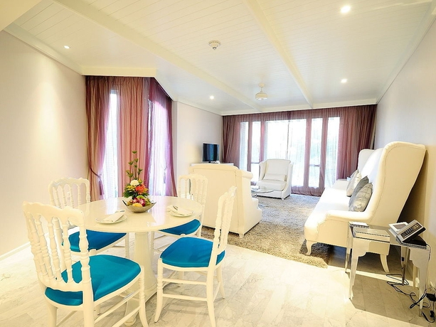 Imagen de la habitación del Hotel Hua Chang Heritage Bangkok. Foto 7