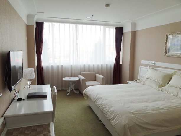 Imagen de la habitación del Hotel Hua Cheng Hotel. Foto 4