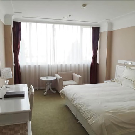 Imagen de la habitación del Hotel Hua Cheng Hotel. Foto 8