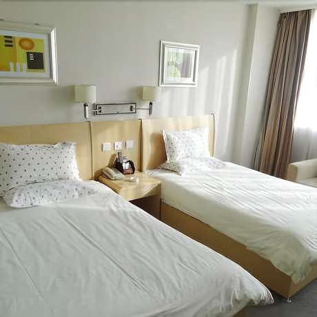 Imagen de la habitación del Hotel Hua Cheng Hotel. Foto 9