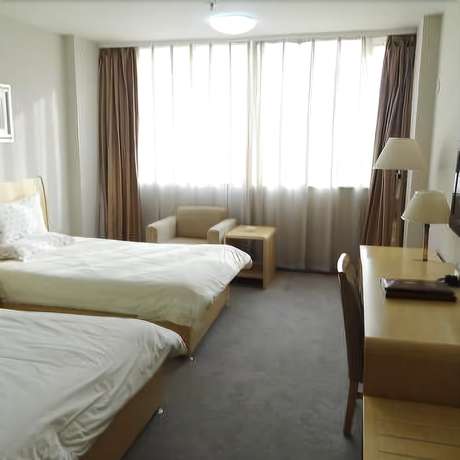 Imagen de la habitación del Hotel Hua Cheng Hotel. Foto 14