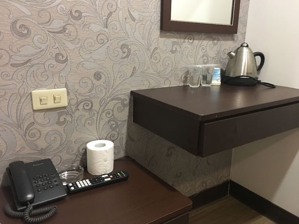 Imagen de la habitación del Hotel Hua Chun Lin. Foto 2