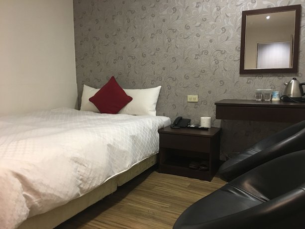 Imagen de la habitación del Hotel Hua Chun Lin. Foto 3