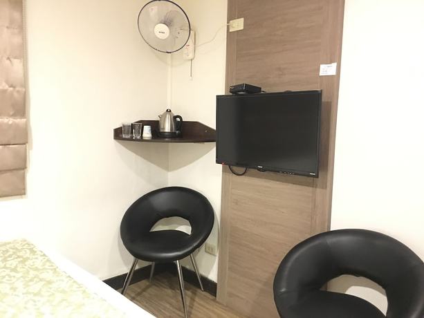 Imagen de la habitación del Hotel Hua Chun Lin. Foto 5