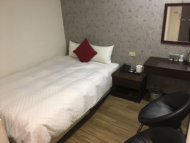 Imagen de la habitación del Hotel Hua Chun Lin. Foto 7