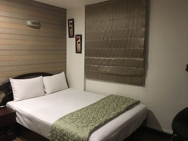 Imagen de la habitación del Hotel Hua Chun Lin. Foto 11