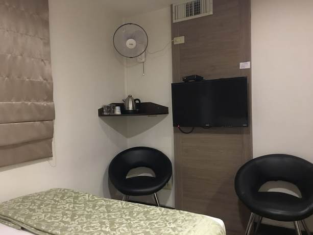 Imagen de la habitación del Hotel Hua Chun Lin. Foto 12