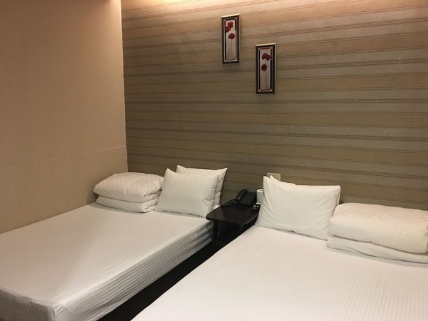 Imagen de la habitación del Hotel Hua Chun Lin. Foto 13