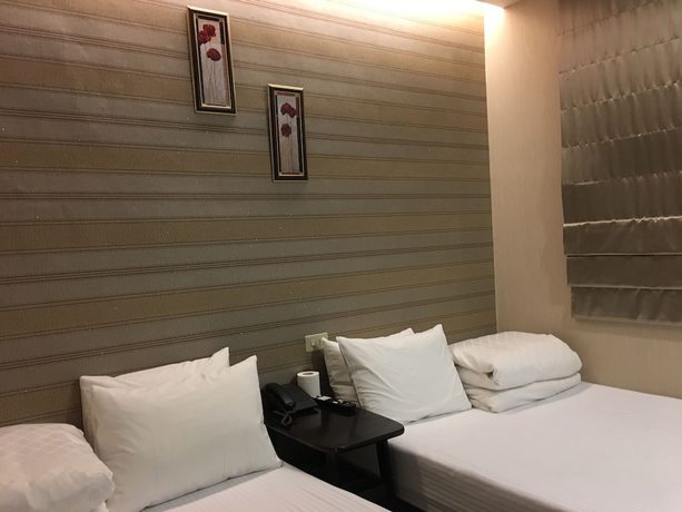 Imagen de la habitación del Hotel Hua Chun Lin. Foto 16