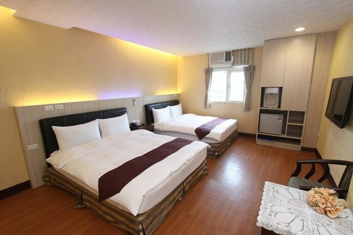 Imagen de la habitación del Hotel Hua Don. Foto 19