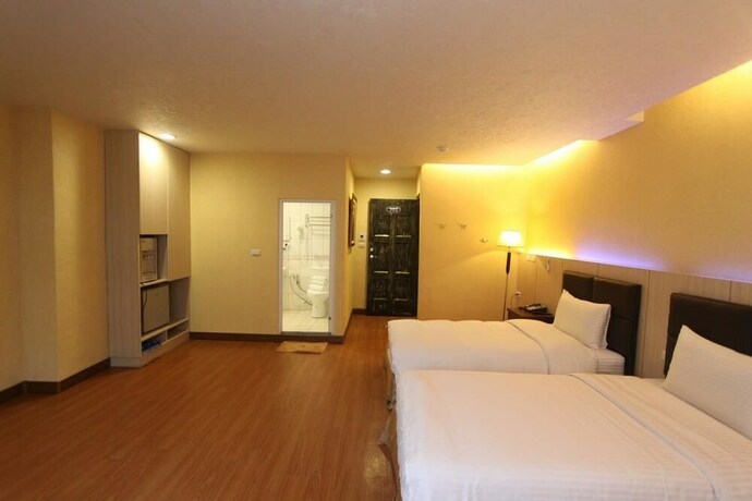 Imagen de la habitación del Hotel Hua Don. Foto 25