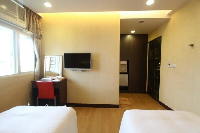 Imagen de la habitación del Hotel Hua Don. Foto 27