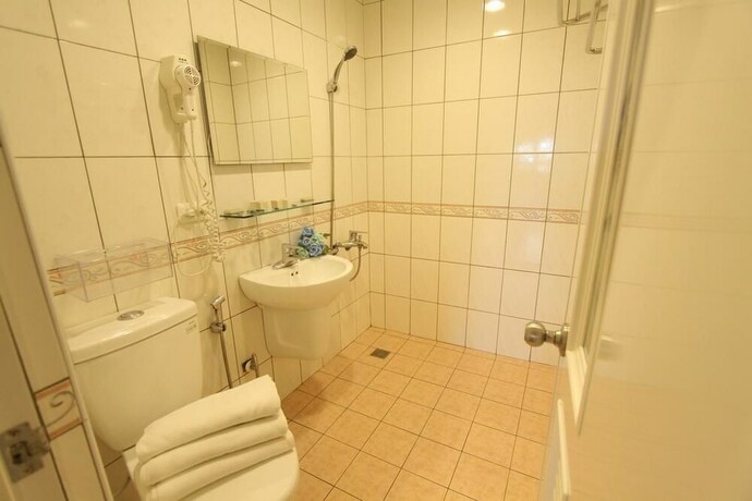 Imagen de la habitación del Hotel Hua Don. Foto 30