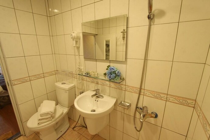 Imagen de la habitación del Hotel Hua Don. Foto 32