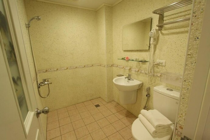 Imagen de la habitación del Hotel Hua Don. Foto 34