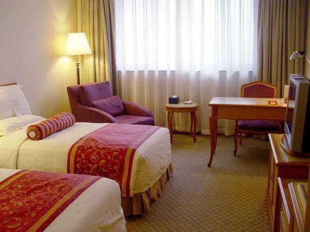 Imagen de la habitación del Hotel Hua Du. Foto 5