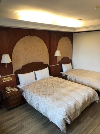 Imagen de la habitación del Hotel Hua Du, Yizhong. Foto 18