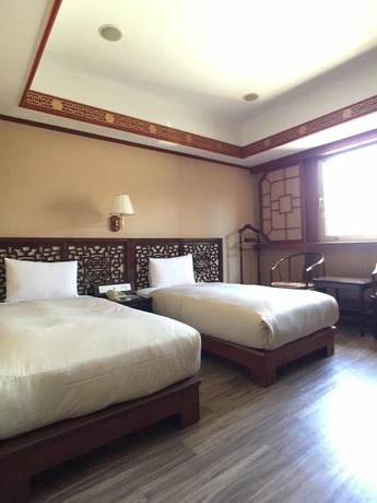 Imagen de la habitación del Hotel Hua Du, Yizhong. Foto 19