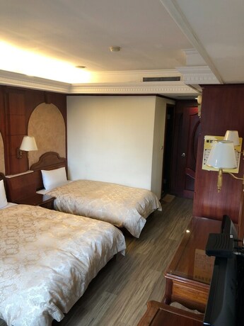 Imagen de la habitación del Hotel Hua Du, Yizhong. Foto 21
