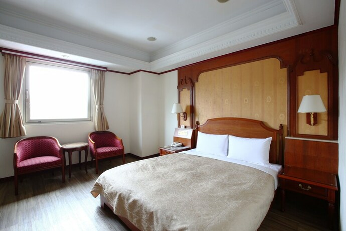 Imagen de la habitación del Hotel Hua Du, Yizhong. Foto 26