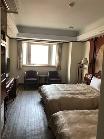 Imagen de la habitación del Hotel Hua Du, Yizhong. Foto 32