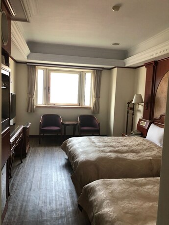Imagen de la habitación del Hotel Hua Du, Yizhong. Foto 33