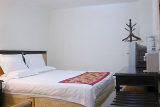 Imagen de la habitación del Hotel Hua Fu International. Foto 4