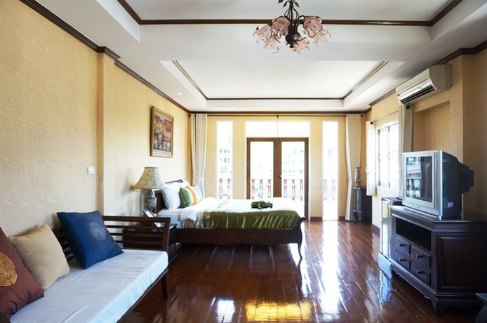 Imagen de la habitación del Hotel Hua Hin White Villa. Foto 9