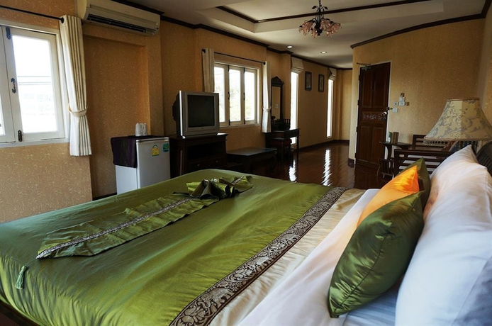 Imagen de la habitación del Hotel Hua Hin White Villa. Foto 14