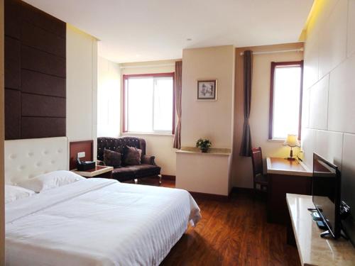 Imagen de la habitación del Hotel Hua Qi Kaiserdom Zhongshan Road St Michael's Cathedral and Zhanqiao Pier Qingdao. Foto 7