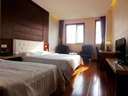 Imagen de la habitación del Hotel Hua Qi Kaiserdom Zhongshan Road St Michael's Cathedral and Zhanqiao Pier Qingdao. Foto 8