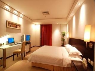 Imagen de la habitación del Hotel Hua Shi. Foto 7