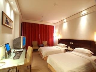 Imagen de la habitación del Hotel Hua Shi. Foto 8