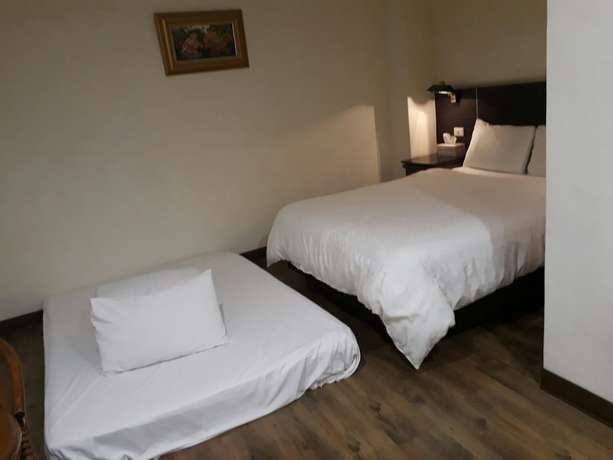 Imagen de la habitación del Hotel Hua Tai. Foto 2