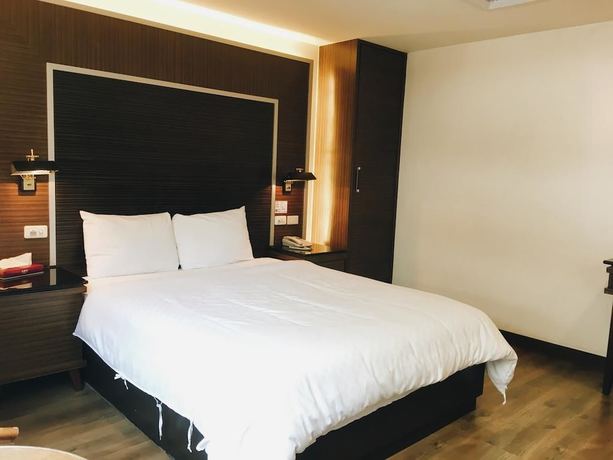 Imagen de la habitación del Hotel Hua Tai. Foto 3