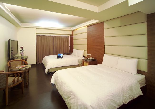 Imagen de la habitación del Hotel Hua Tai. Foto 4