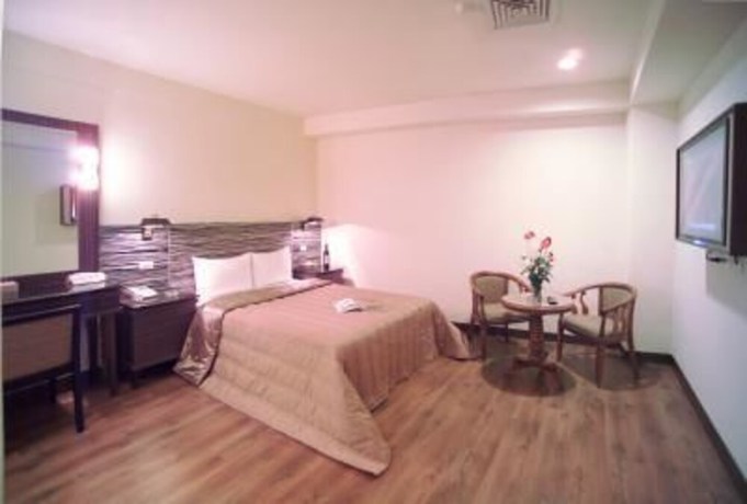Imagen de la habitación del Hotel Hua Tai. Foto 5