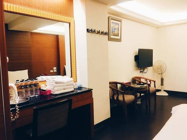 Imagen de la habitación del Hotel Hua Tai. Foto 7